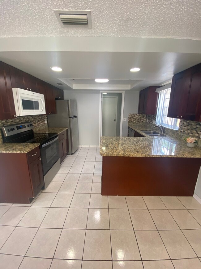 12703 Alida Pl
