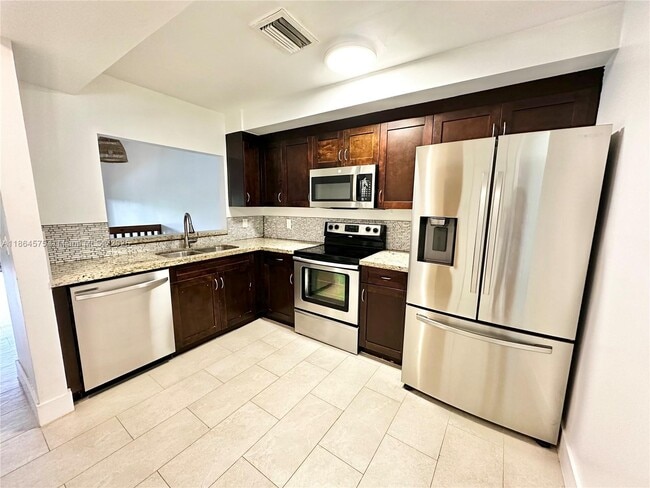 Building Photo - 4245 S Pine Island Rd Rental