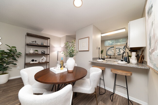 Dining area with hardwood-style flooring