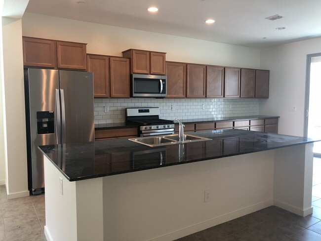 Spacious kitchen with ample storage - separate pantry too. - 23625 West Watkins St House