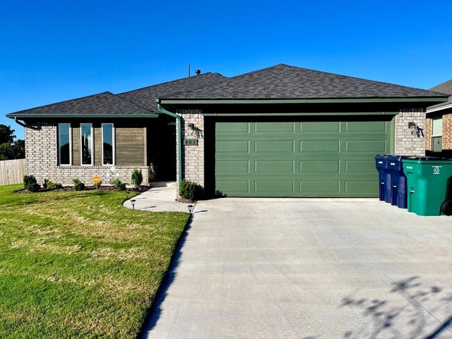Building Photo - Spacious Yukon Home with Storm Shelter, 2-Car Garage & Fenced Yard!