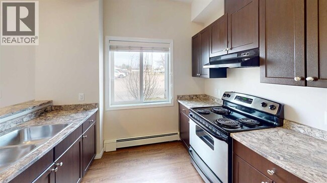 Photo - 10004-1097A 97A St