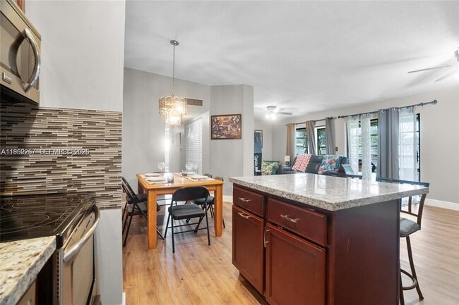 Building Photo - 9606 W McNab Rd Unit 202