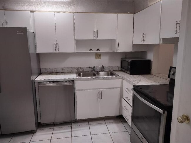 Building Photo - 2060 NW 48th Terrace Unit 116 Rental