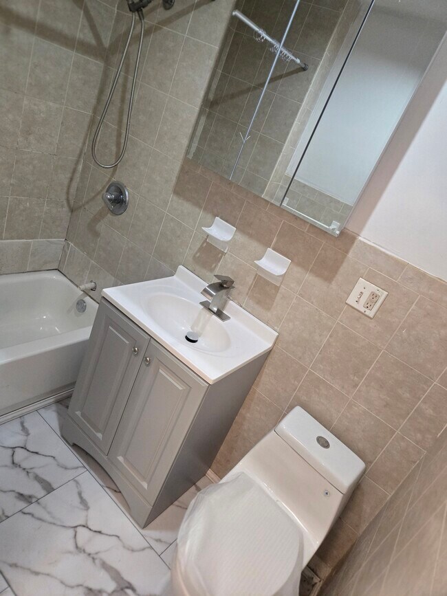 Photo - 945 E 220th St Unit 1