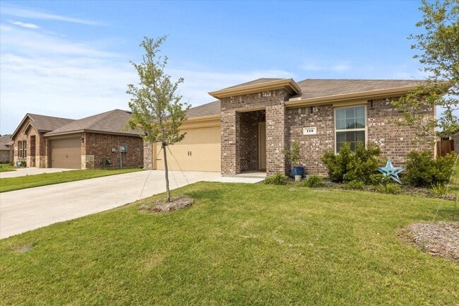 Photo - Modern single-story home with 4 bedrooms, 2 bathrooms, open-concept living, stylish kitchen, two-...