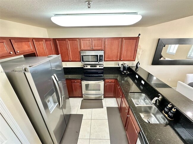 Building Photo - 11403 NW 89th St Unit 219