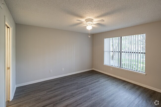 2BR, 2BA - 1,112SF - Orchid - Primary Bedroom - Oasis Naples Apartments