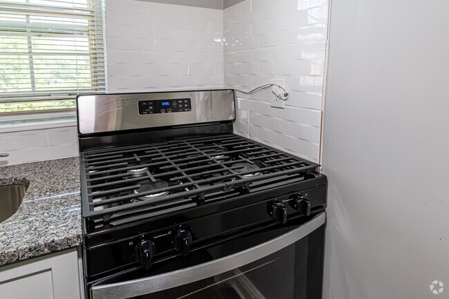 2BR, 1BA - Kitchen - Eternal Apartments