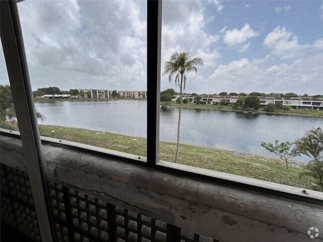 Building Photo - 3301 Spanish Moss Terrace Unit 308 Rental