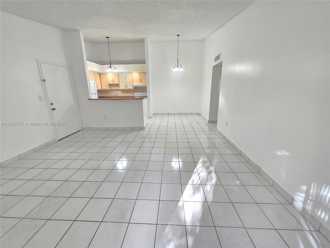 Building Photo - 18875 NW 62nd Ave Unit 202