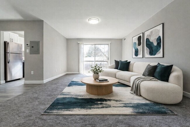 Step into a beautifully designed living space at Parkside Apartments. With modern decor and abundant natural light, this inviting area is perfect for relaxation and entertainment. Elevate your lifestyle today; schedule a tour now!