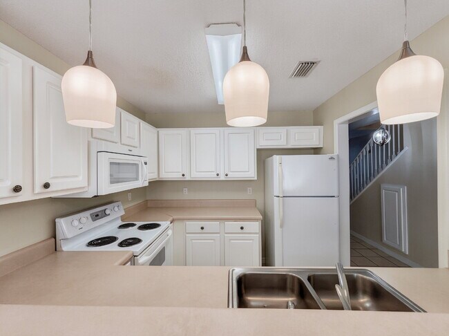 Photo - "Charming 2-Bed Townhouse Retreat on Scenic Oak Ln!"