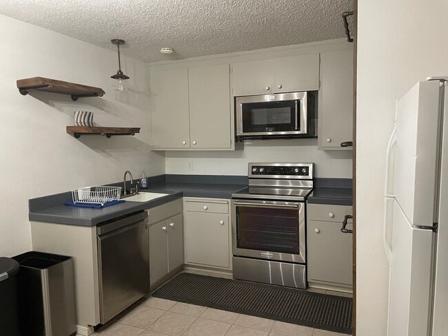 Photo - Upstairs Condo - 2 Bed, 1 Bath - Centrally...