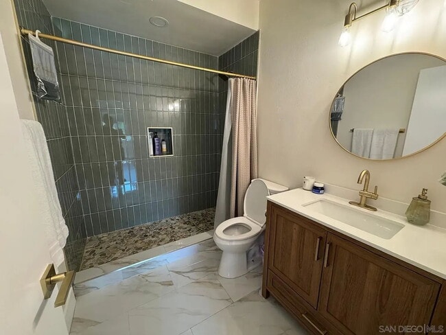 Photo - Studio rental available in a beautifully renovated single-story ranch property located in the hig... Unit 1/2
