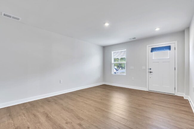 Photo - Modern Comfort: 3 Bed, 2.5 Bath Townhome + Primary on Main $2,050/mo rent