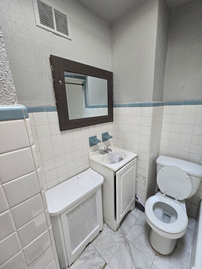Photo - 3BR Home + Finished Basement + 1BR Apt