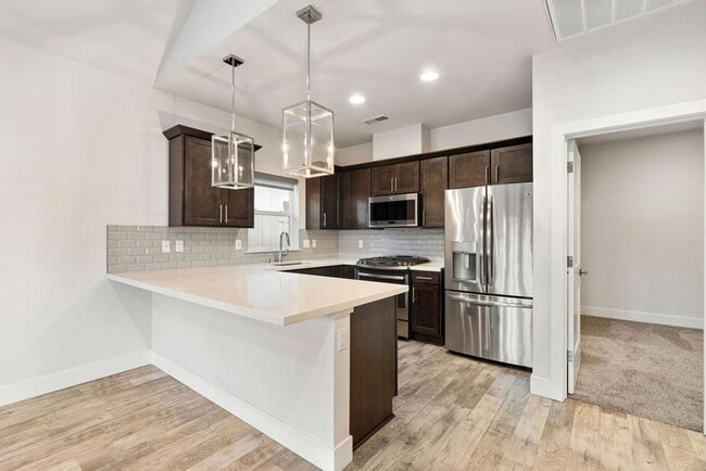 Photo - Contemporary Dual Level MidTown Bungalow with Balcony & Garage!