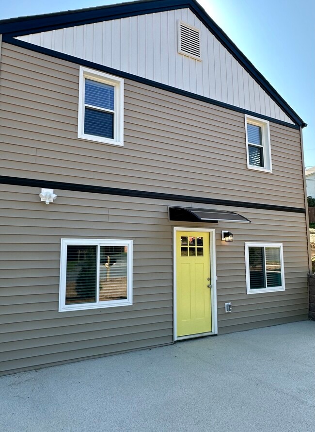 Private covered front entry - 2304 Belle Ave NE Unit A