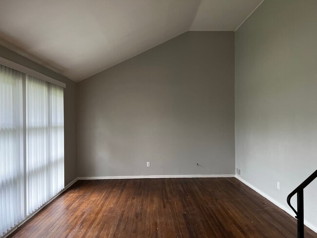 Photo - 3 BR 1.5 BA split-level with attached 1 car garage