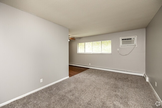 1 habitación, 1 baño - 750 pies cuadrados - Sala de estar - Urban Green Apartments - Urbandale