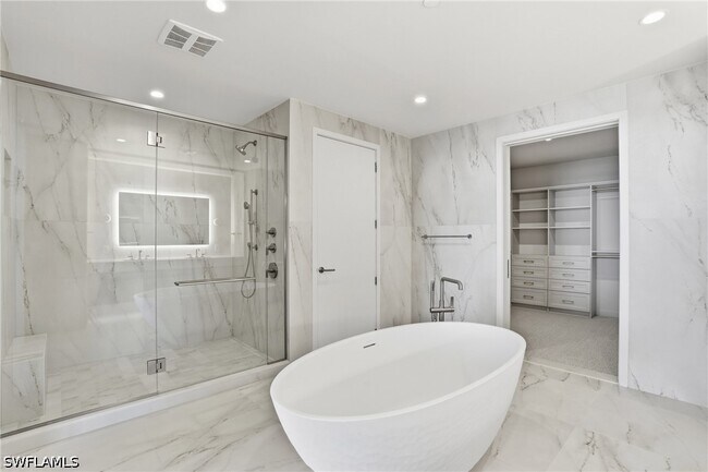 Building Photo - 5100 Seagrass Blvd Unit 306