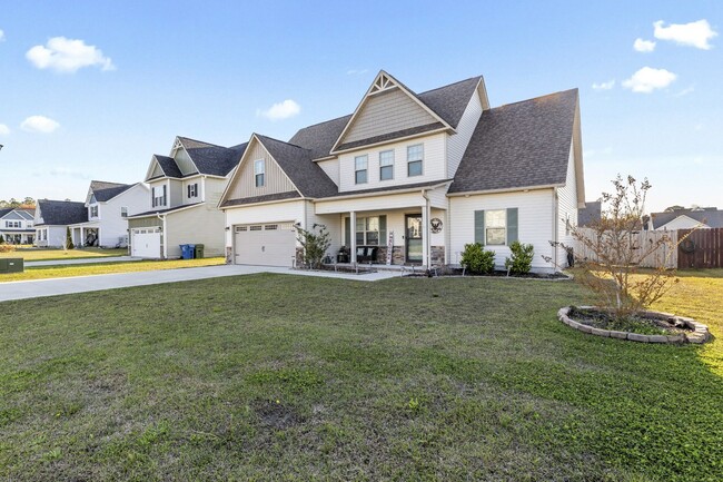 Photo - 3 Bedroom + Bonus Room Home with Main Floor Primary Suite & Community Pool Access