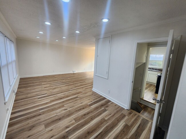 Photo - Newly updated 3 bedroom 1.5 bath home for rent with partial finished basement with additional bed...