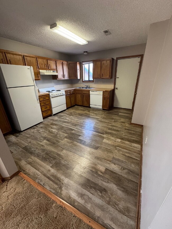Photo - "Charming 2-Bed Duplex in Derby, KS – Your Cozy Retreat Awaits at 206 Osage!"
