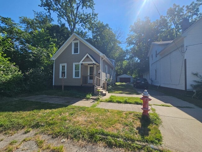 Photo - Spacious 4-Bedroom Cleveland Home with Updated Flooring & 2-Car Garage