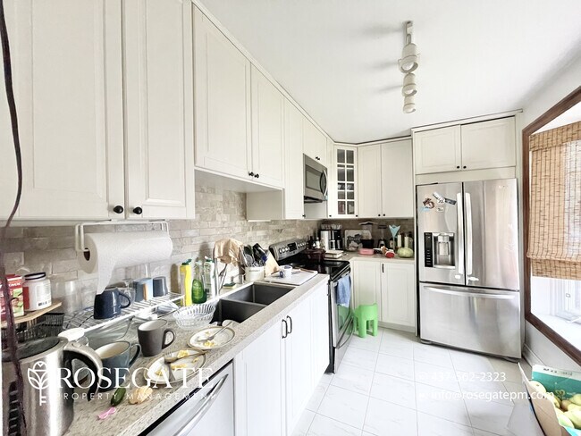Photo - Charming 3-Bedroom Home with Backyard & Pa... Unit 1
