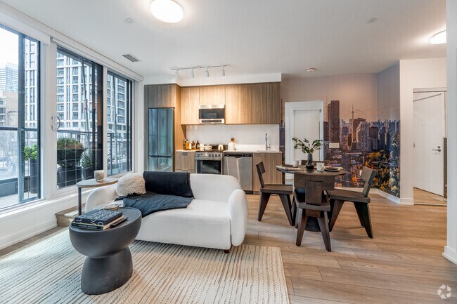 2BR, 2BA - 783SF - Living Room - The Corner On Broadway