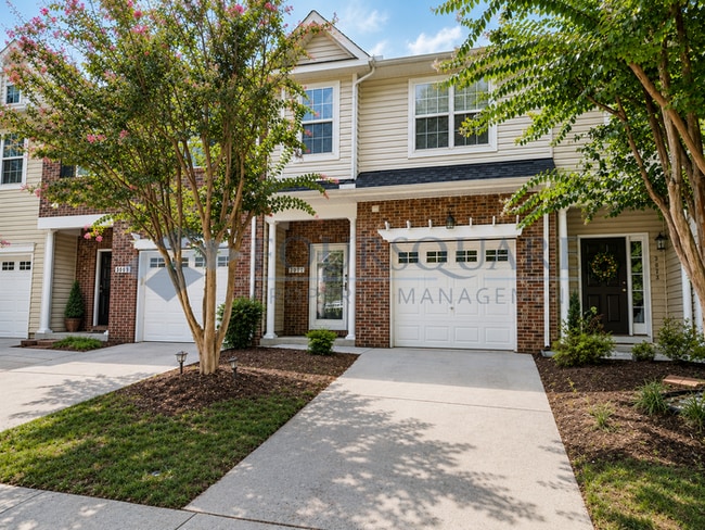 Photo - Lovely 3-Bedroom Townhome with Fireplace, Back Patio & Community Amenities Included! Convenient ...