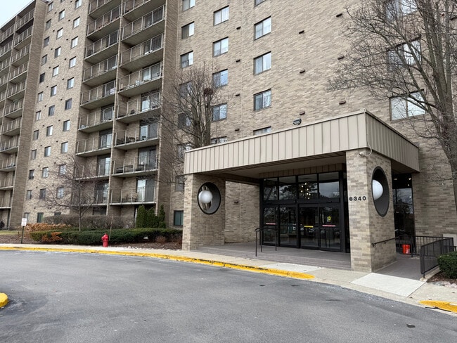 Building Photo - 6340 Americana Dr Unit 1102