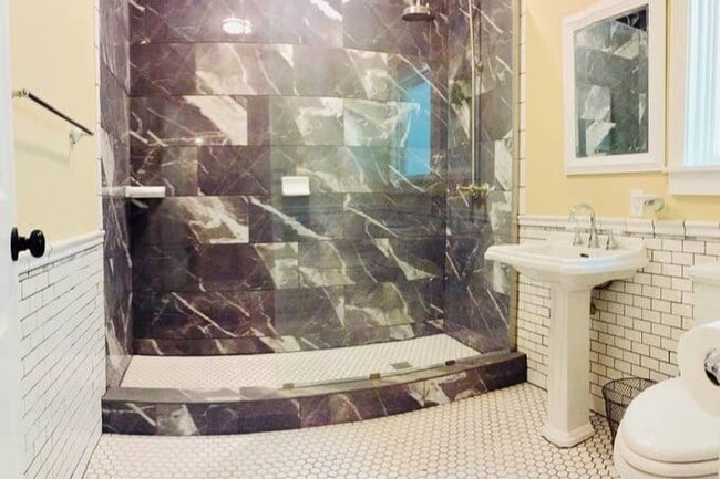 Beautiful new bathroom with a walk-in shower. - 816 W Hopkins St Unit Apt A