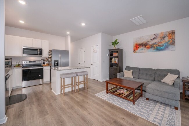 Photo - Bright 3-Bed End-Unit Townhome in Cedar Station with Modern Finishes & Private Outdoor Spaces