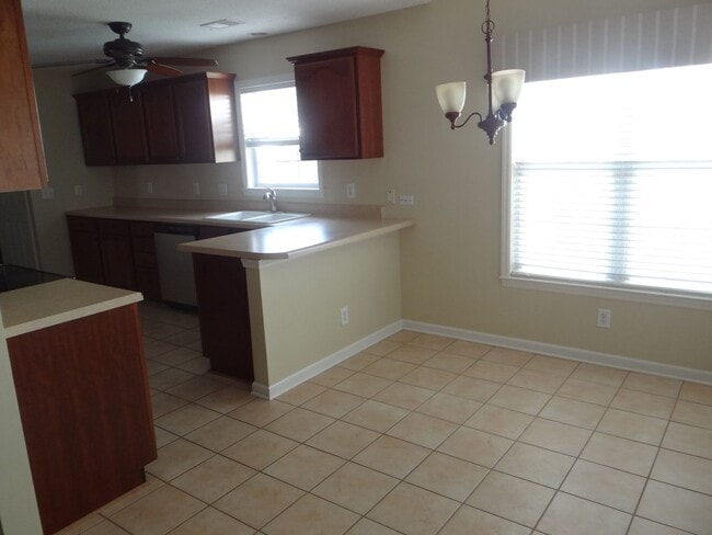Photo - Lovely 3 bedroom 2 bath home in 55 and older neighborhood with 2 car garage