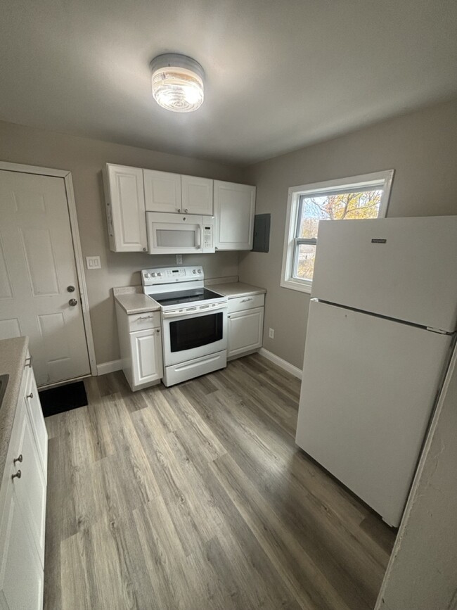 Kitchen - 1146 N Pennsylvania Ave Apartments Unit Upstairs