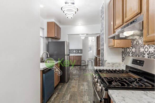 Photo - $1000 Off First Month! Spacious 3-Bed, 2-B...