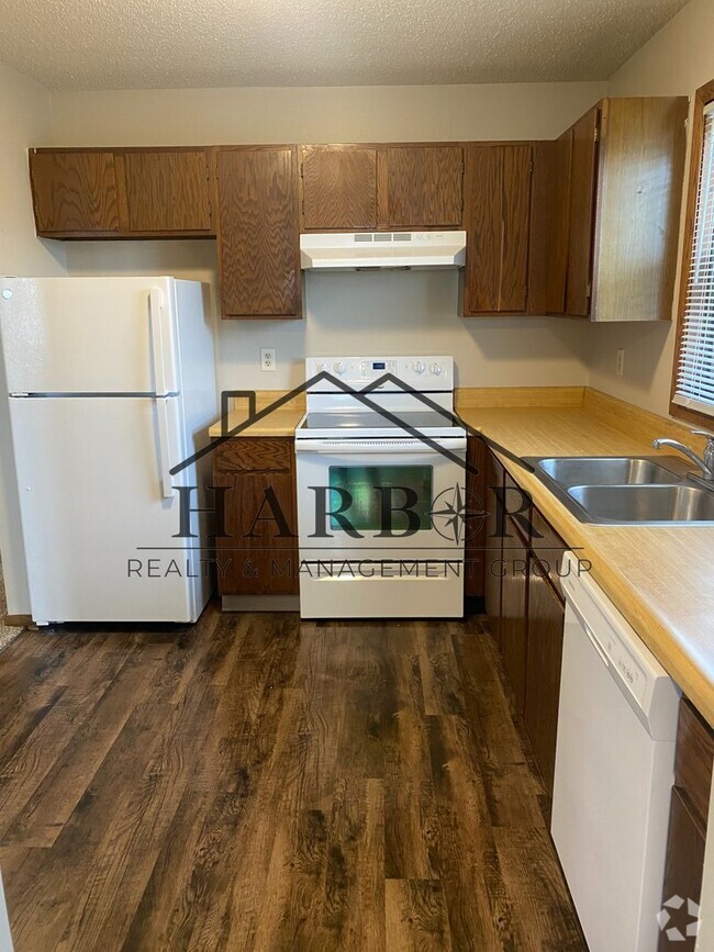 Building Photo - 2426 30th Ave NW Unit D Rental