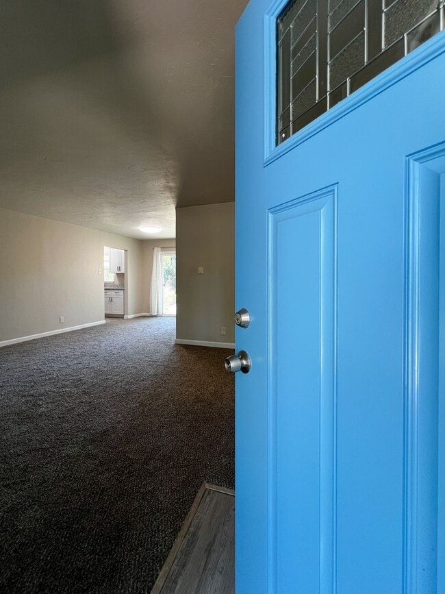 Photo - Freshly Renovated 3 Bedroom Home with Large Fenced Yard & Double Garage