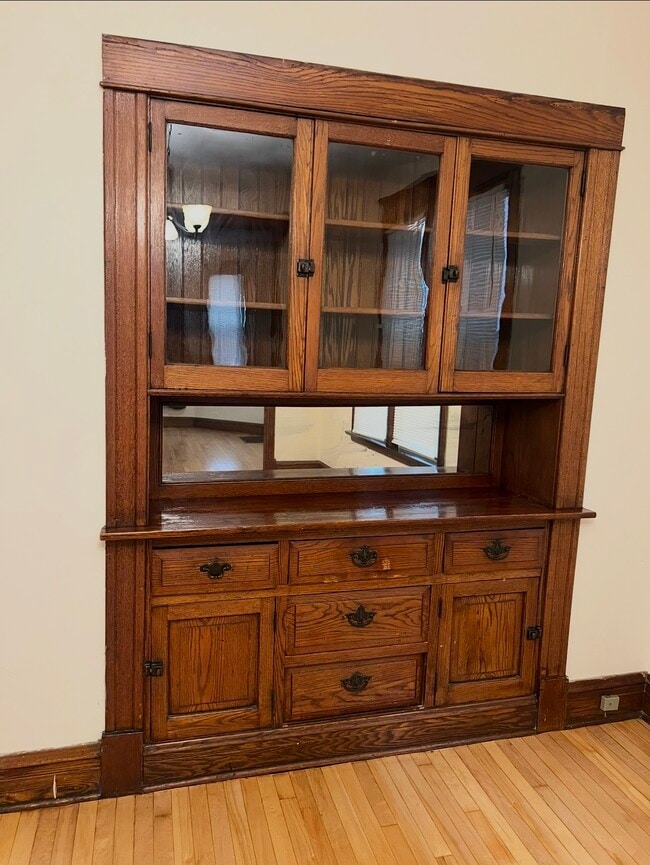 Dining room with a built-in hutch cabinet - 3748 W Lyndale St Unit 1st