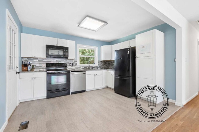 Photo - "Charming 3-Bed Oasis with Scenic Views & Modern Touches on Faubus Drive!"