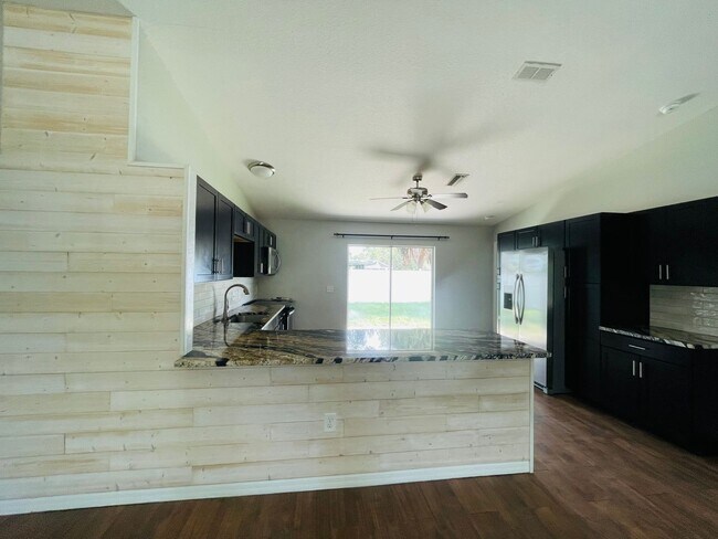 Photo - *UPDATED NORTH PORT 3/2/2 HOME*