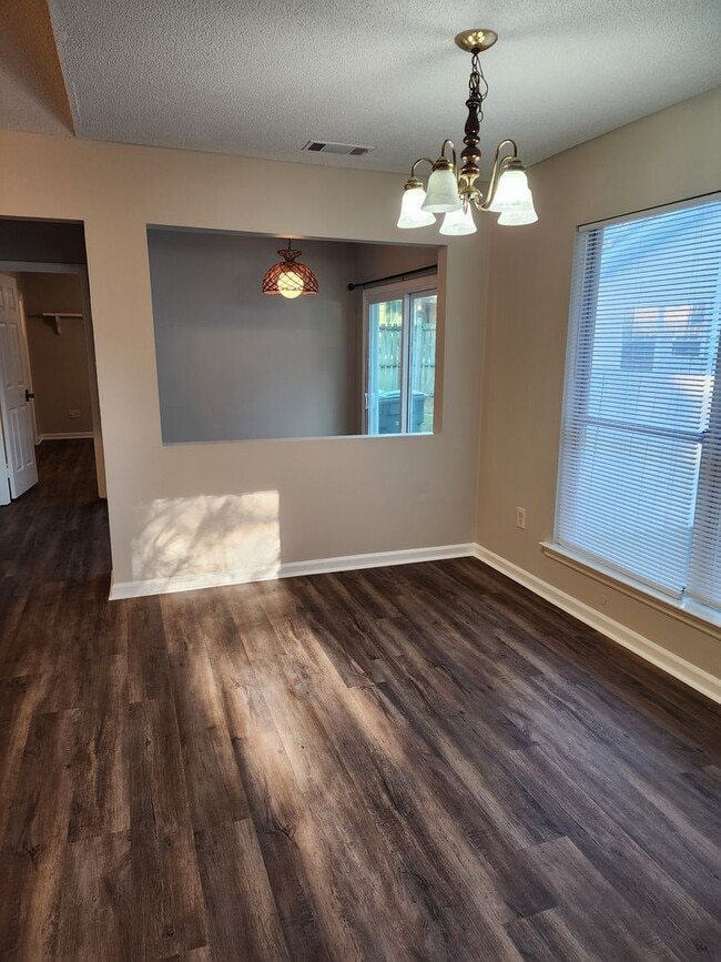 Photo - Spacious 2 bedroom 2 bath townhome with walk in closets, fireplace, and washer/ dryer included.