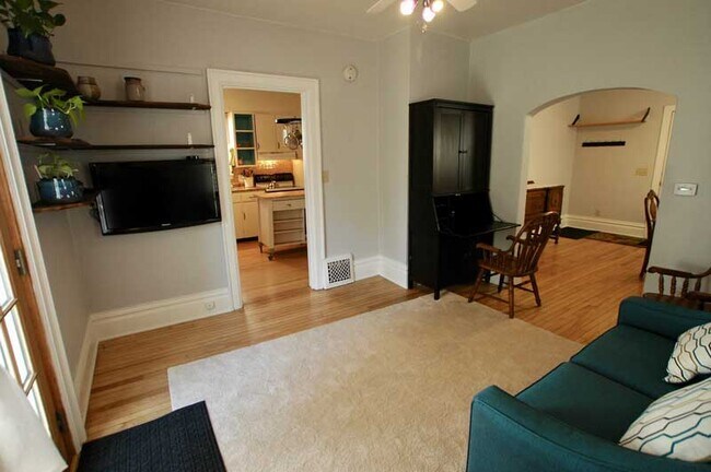 Living room with secretary desk - 310 Elmside Boulevard Unit 1