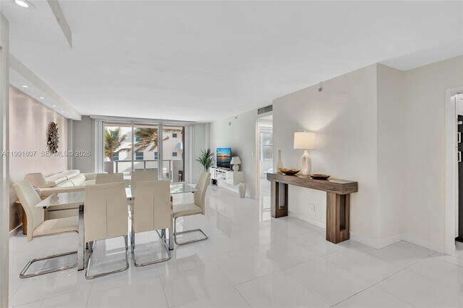 9195 Collins Ave Unit 303