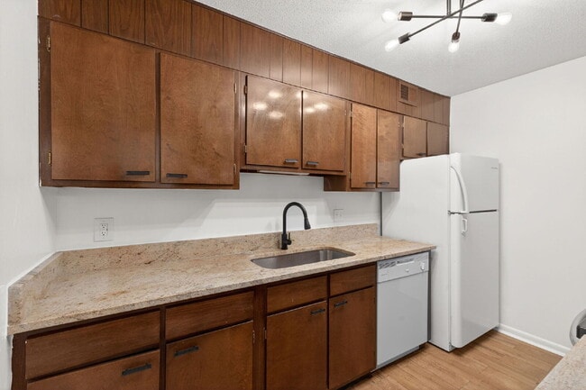 Photo - Move-In Ready 2BR Condo | Pool Access & Water Included