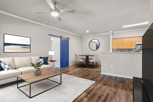 Kitchen, living, and dining area with hard surface flooring