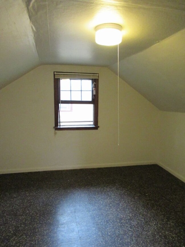 Photo - 3 bedroom, 1 bath. Large yard with large storage shed.